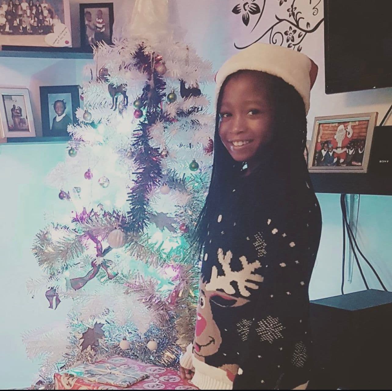 Elizabeth near Christmas tree